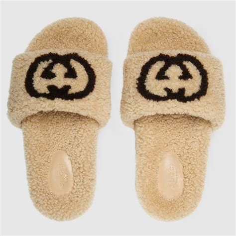 gucci slippers slides|fluffy Gucci slides.